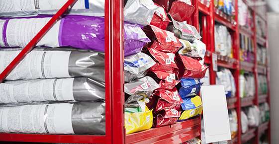 Image of pet food on a store shelf. 
